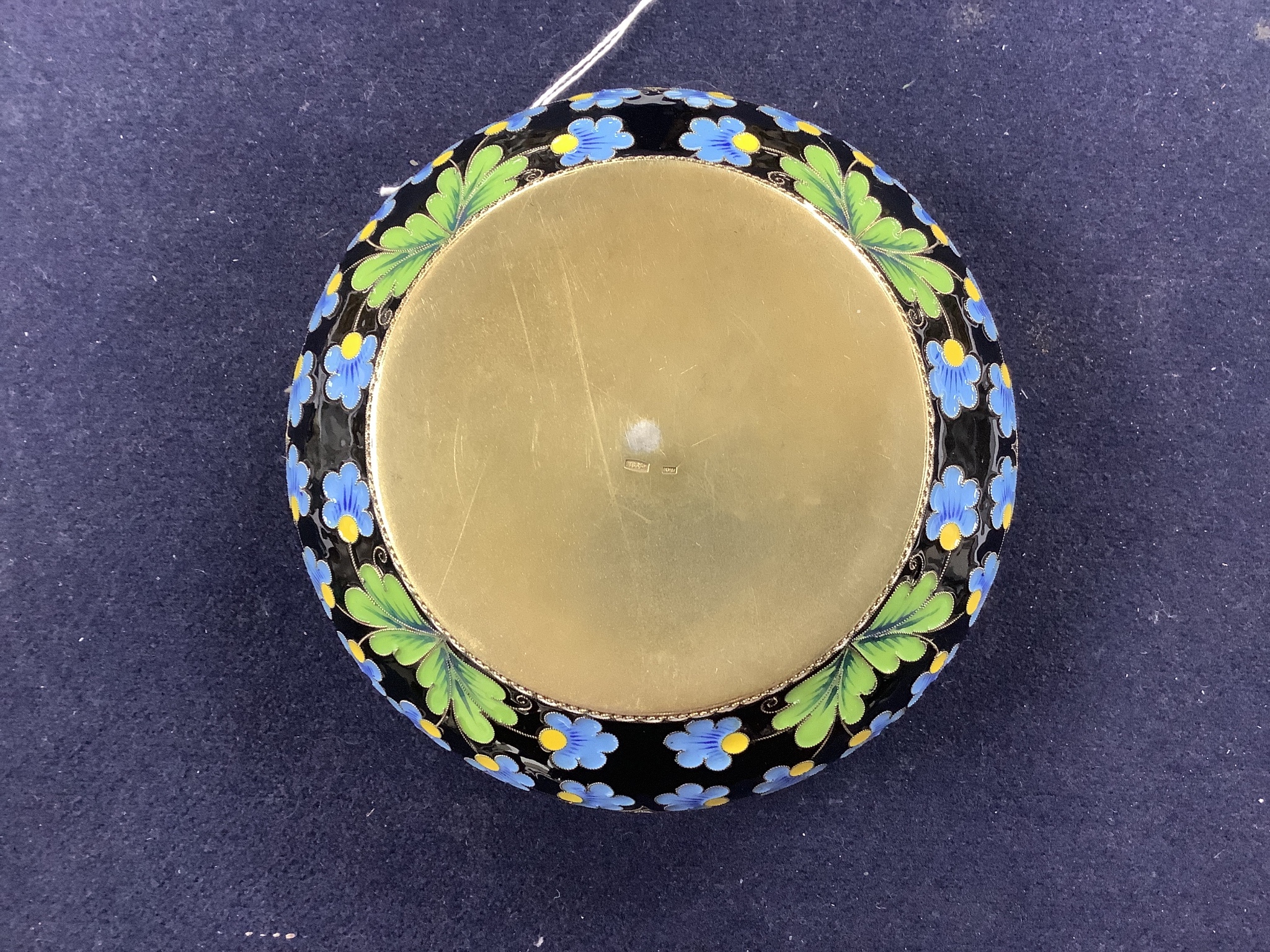 A group of Russian style metalware and a silver and enamel basket